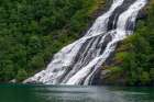 Seven Sisters waterfalls plunges off sheer cliffs into Geirangerfjord-Norway Art Print